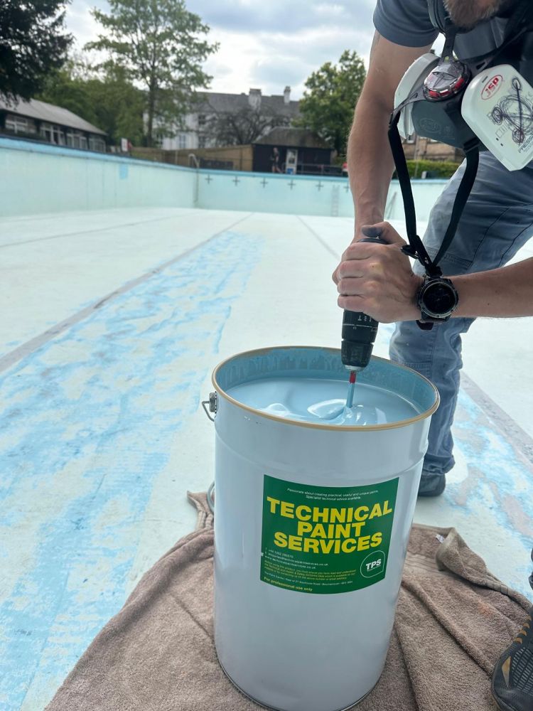 Refurbished spring-fed outdoor pool at The New Bath Hotel & Spa, painted with chlorinated rubber pool coating from Technical Paint Services.